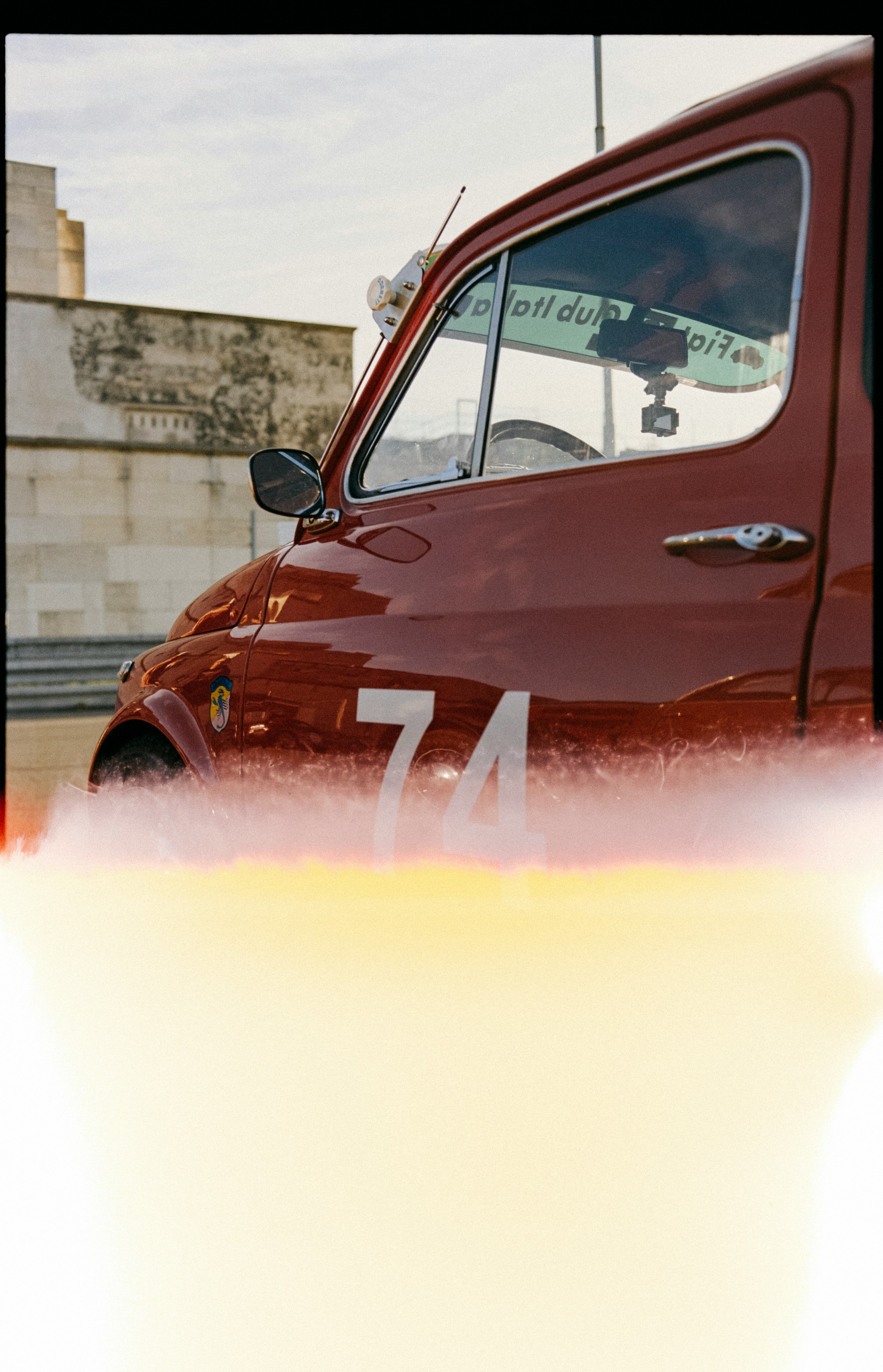 red car on road during daytime